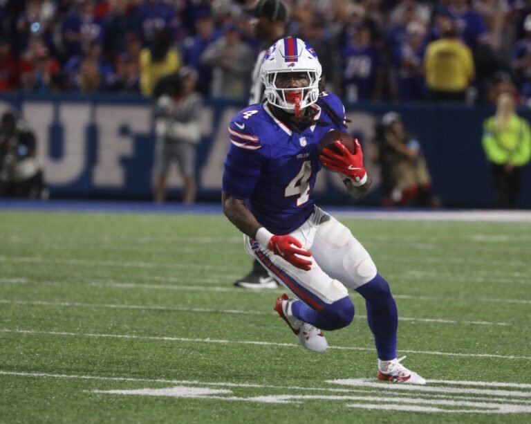 a football player running with a ball