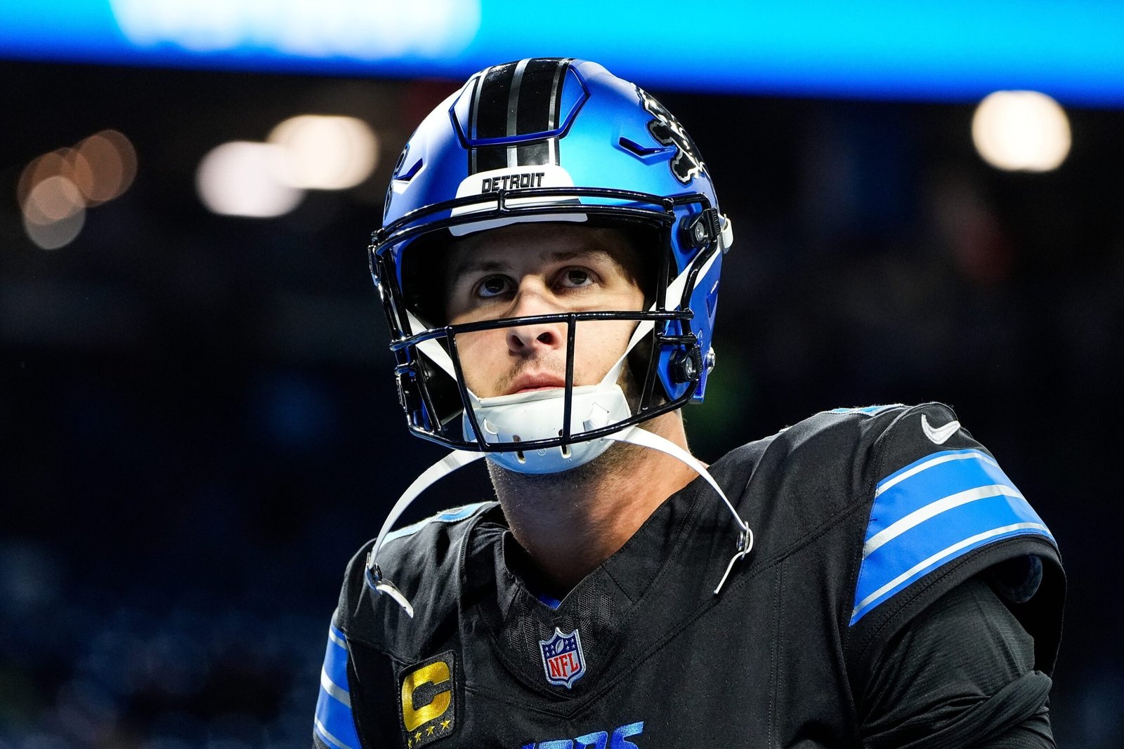 a man wearing a football helmet