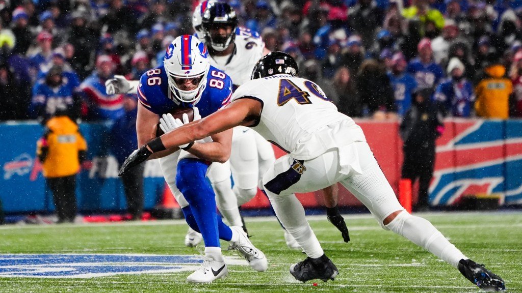 a football player running with the ball