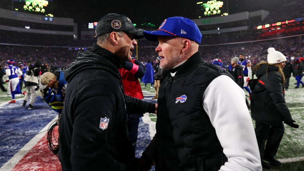 two men talking to each other