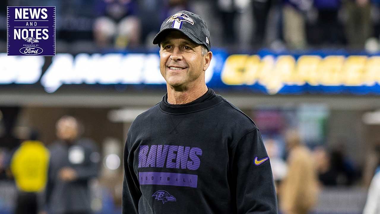 a man wearing a black hat