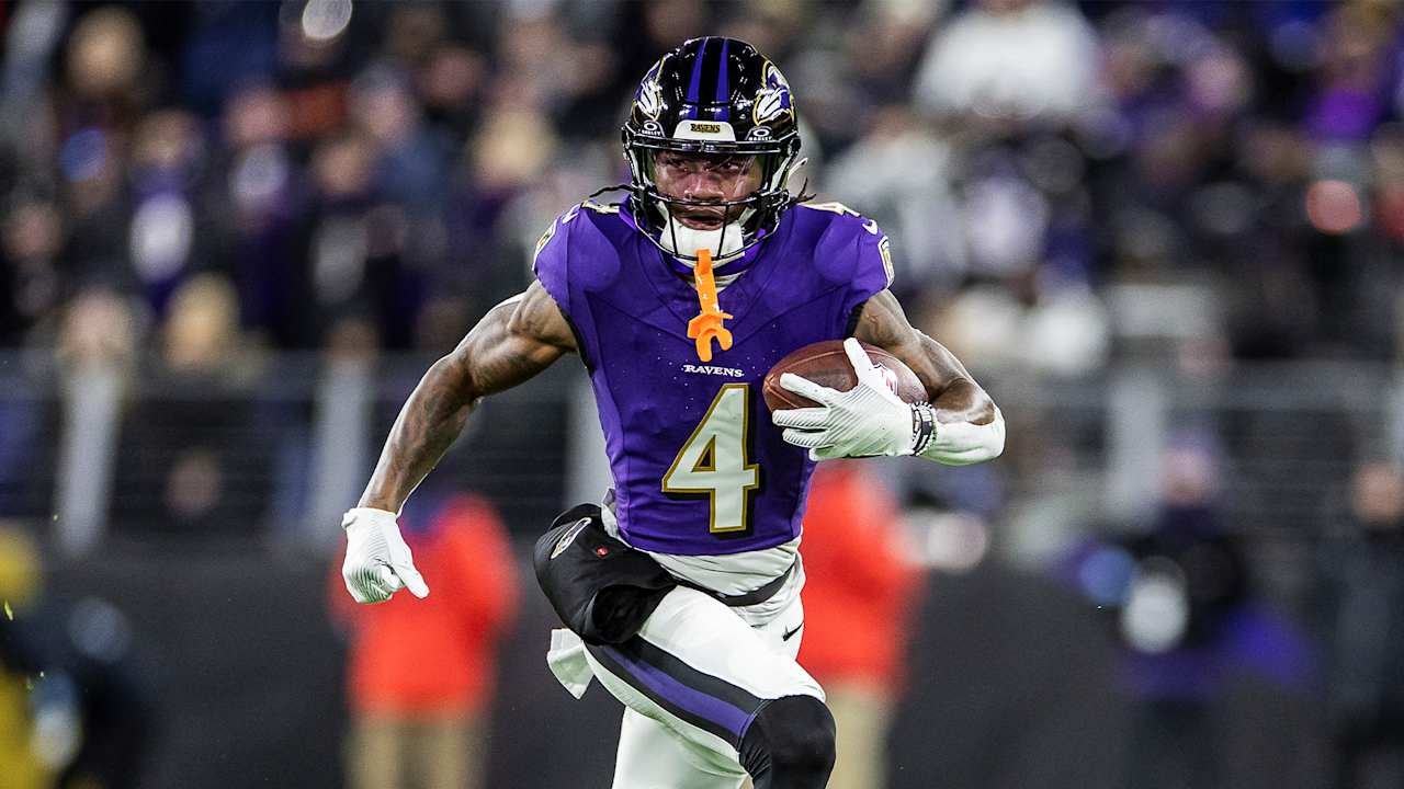 a football player running with a ball