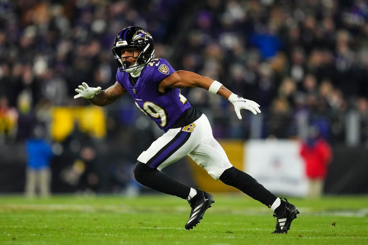 a football player running on a field