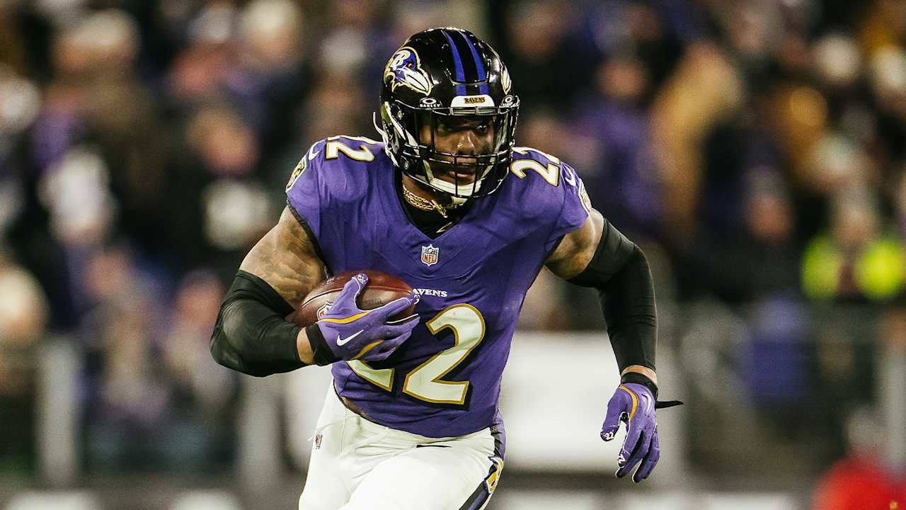 a football player running with a ball